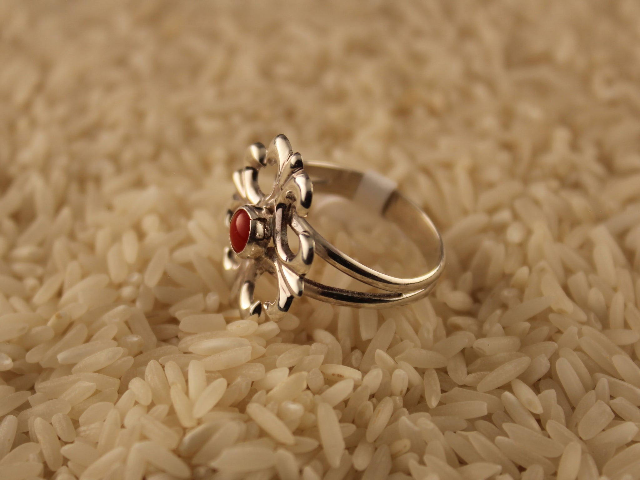 Navajo made silver sandcasted coral ring
